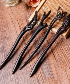 Hand Carved Ebony Clipss